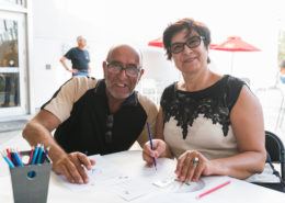 a man and a woman drawing