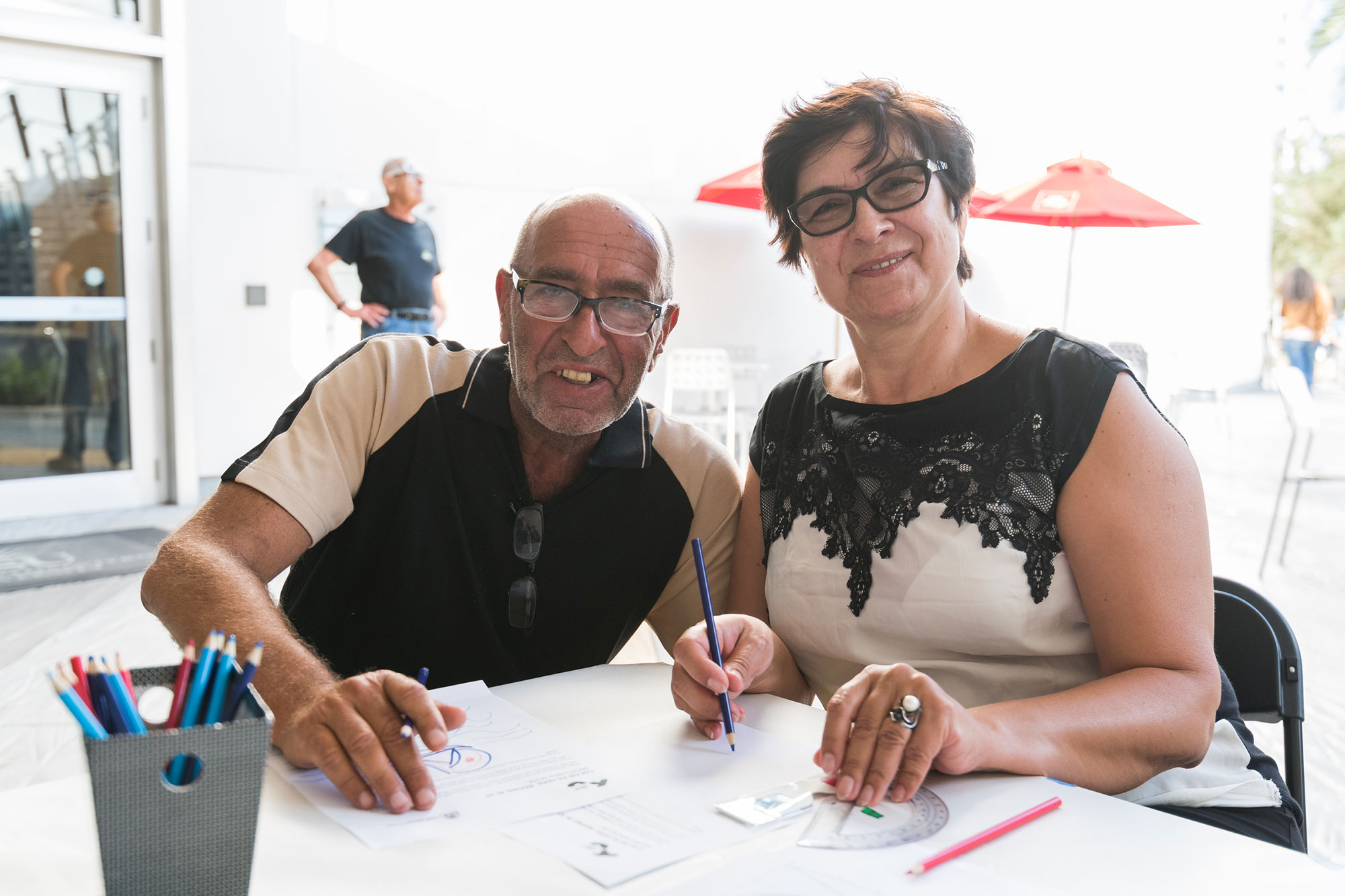 a man and a woman drawing
