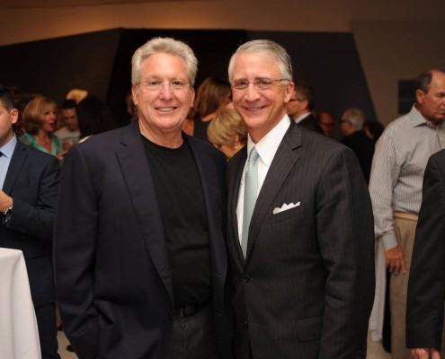 Museum guests smiling at the camera