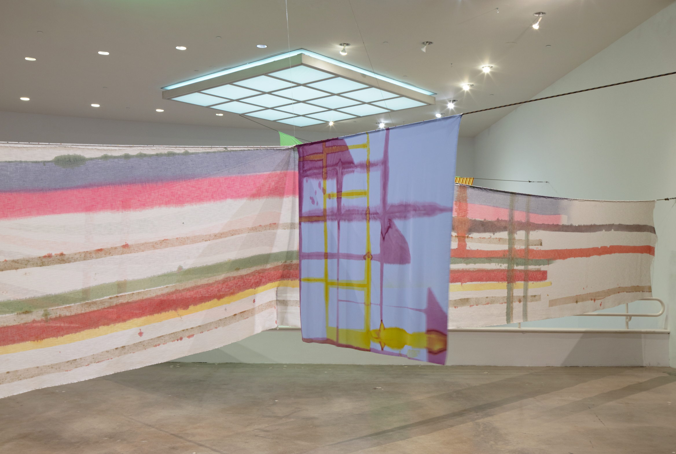 Eric N. Mack, Seat Pleasant, 2019. Dye, cotton fabric, REI climbing rope, straight pins, electric fan 84 × 696 3/16 × 840 3/16 in. Brooklyn Museum, Gift of the artist, 2019.32 © Eric N. Mack. Installation image by Steven Brooke MACK 3113 B