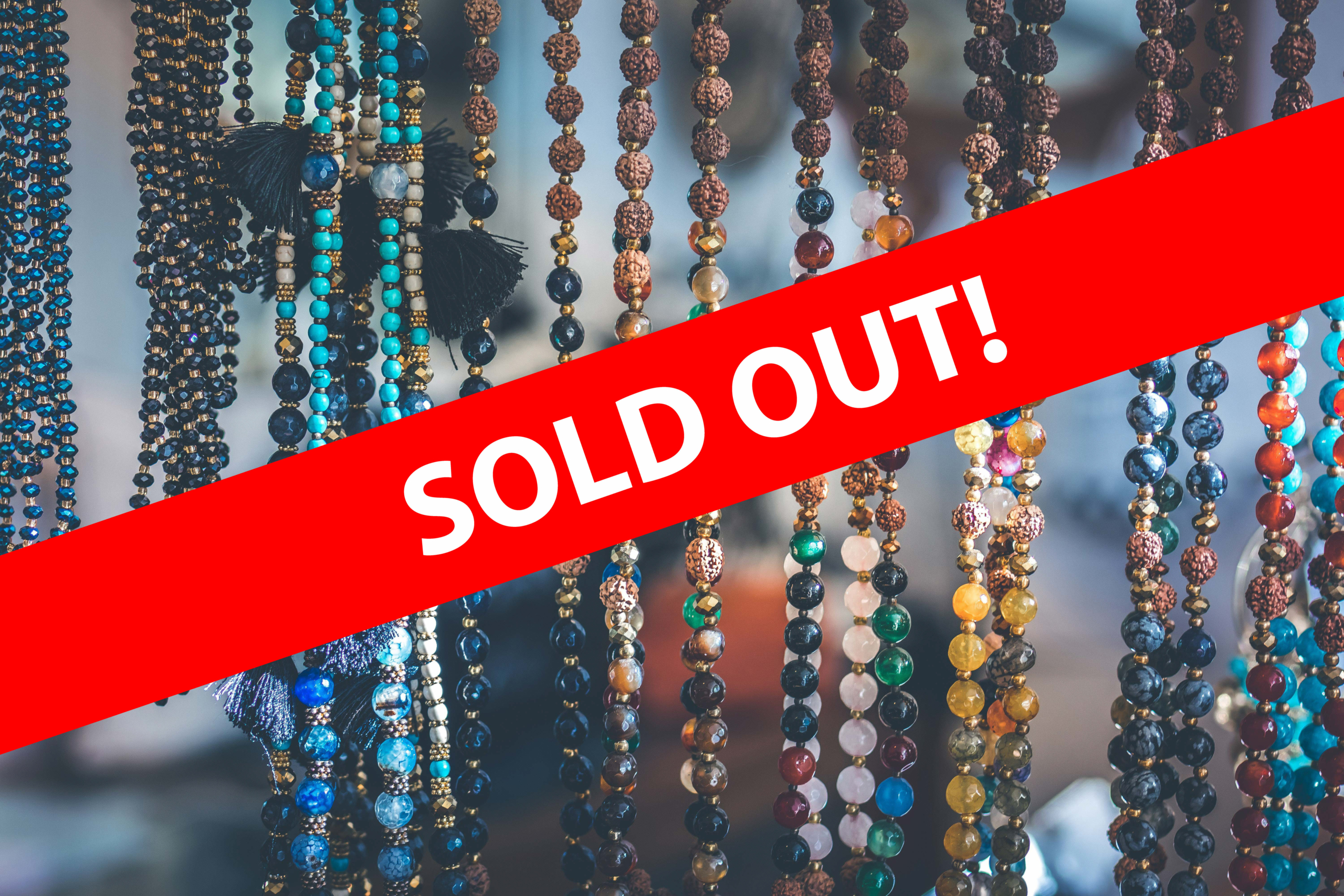 Decorative Beads hanging with "Sold Out" Text in front