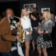 Saxophonist playing to Curator Circle members