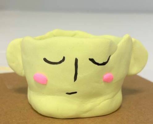 Pinch pot with face