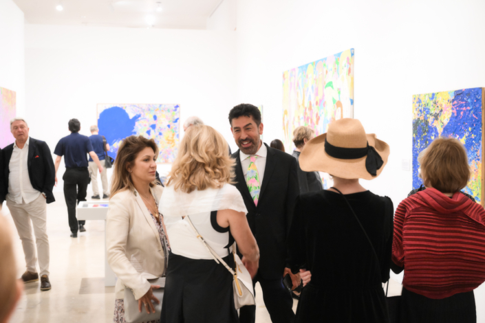 Jesse Ting with guests attending the opening of Walasse Ting: Parrot Jungle at NSU Art Museum Fort Lauderdale.
