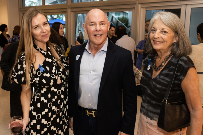 Andrew Heller, Elissa Mogilefsky, and Museum guest