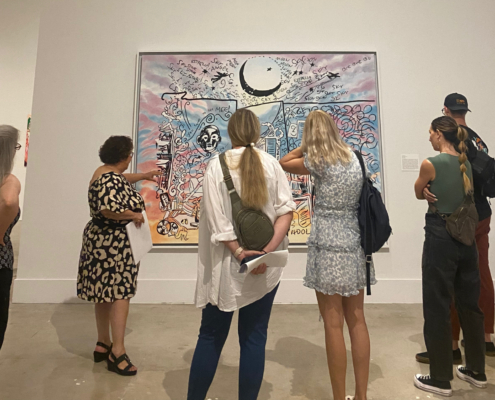 Docent giving tour to museum visitors