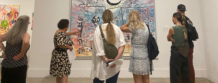 Docent giving tour to museum visitors