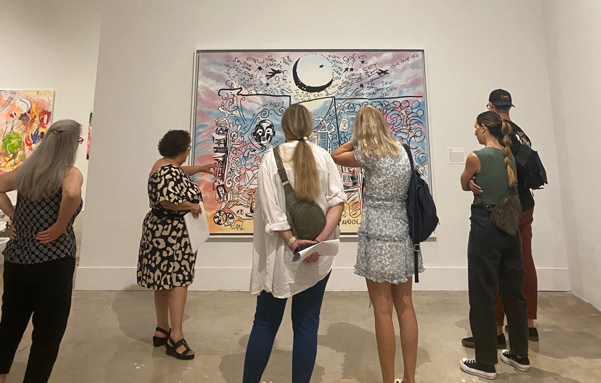 Docent giving tour to museum visitors