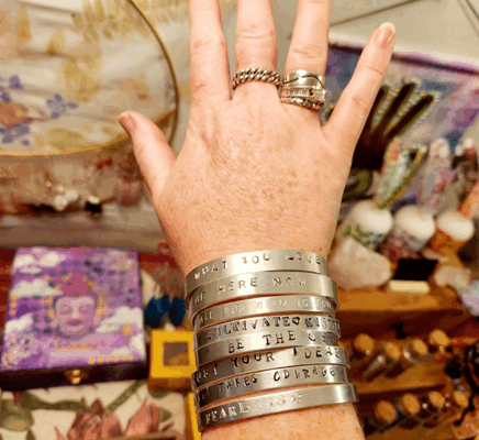 Arm with bracelets and rings